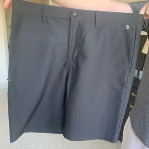 Adidas black golf shorts.